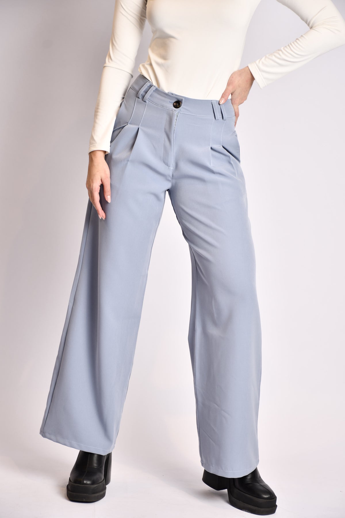 Blue pleated trousers